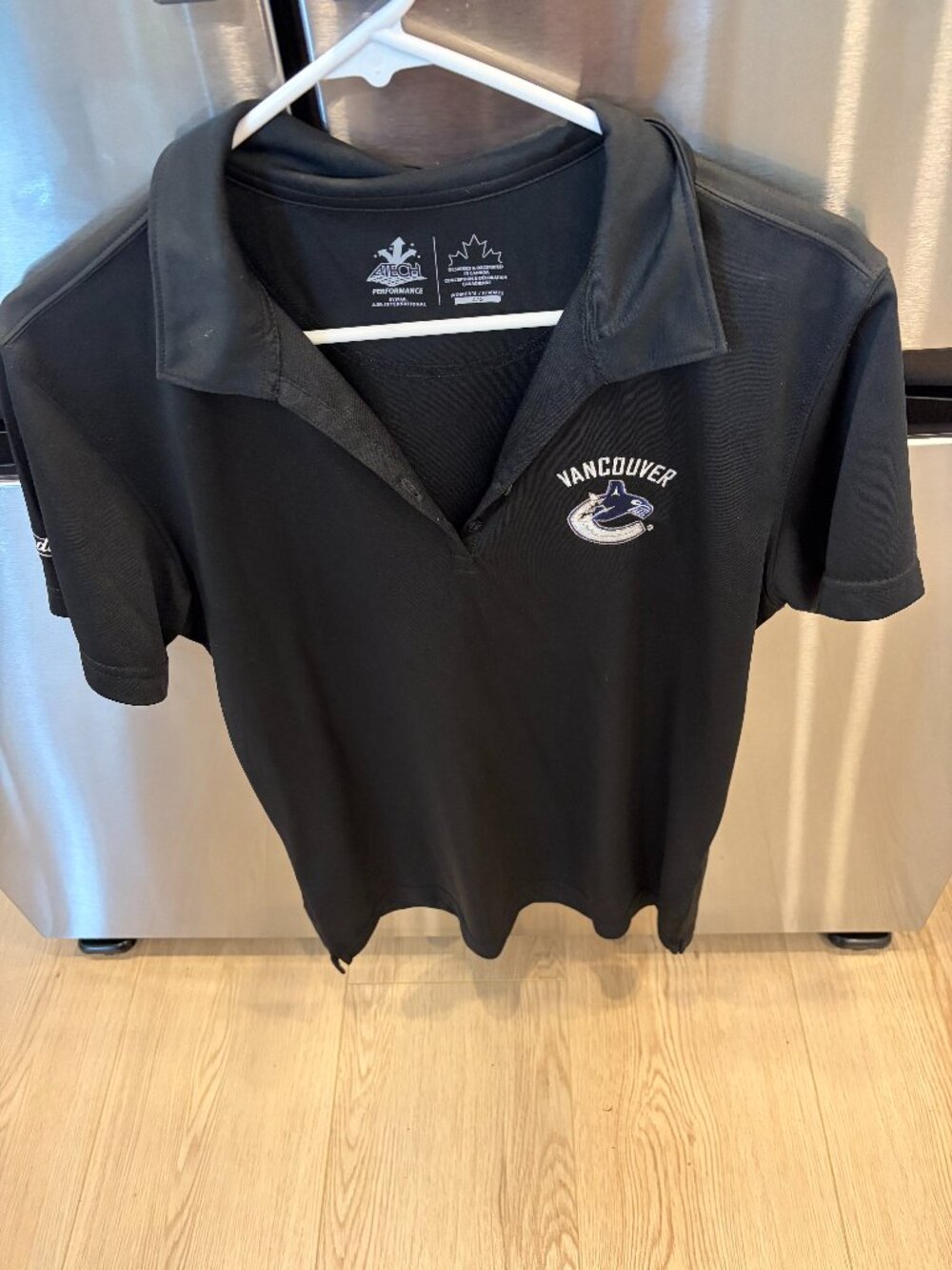 ladies canucks polo shirt